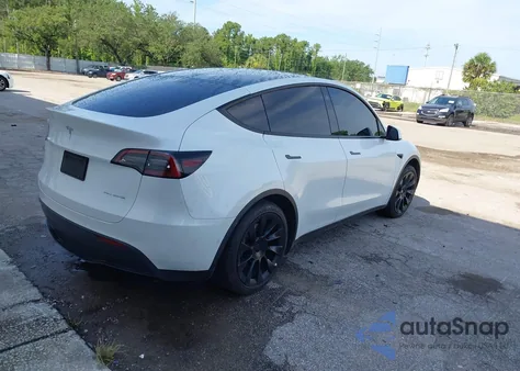 2022 Tesla Model Y Long Range Dual Motor All-Wheel Drive from USA, damaged, VIN 7SAYGAEE2NF542463
